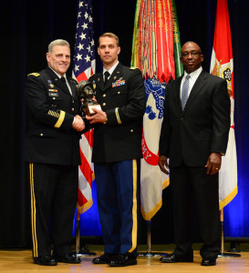 The Chief of Staff of the Army Gen. Mark A. Milley and James Wofford of the Gen. MacArthur Foundation honor 1st Lt. Jason Gehrke with the MacArthur Leadership Award | Courtesy Depatement of Defense 
